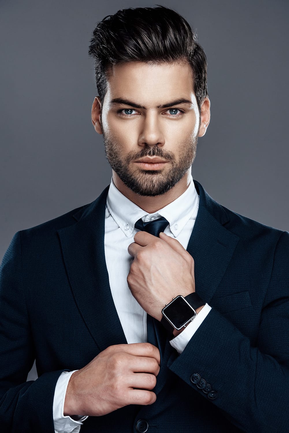 Close-up man is in a white shirt with a tie